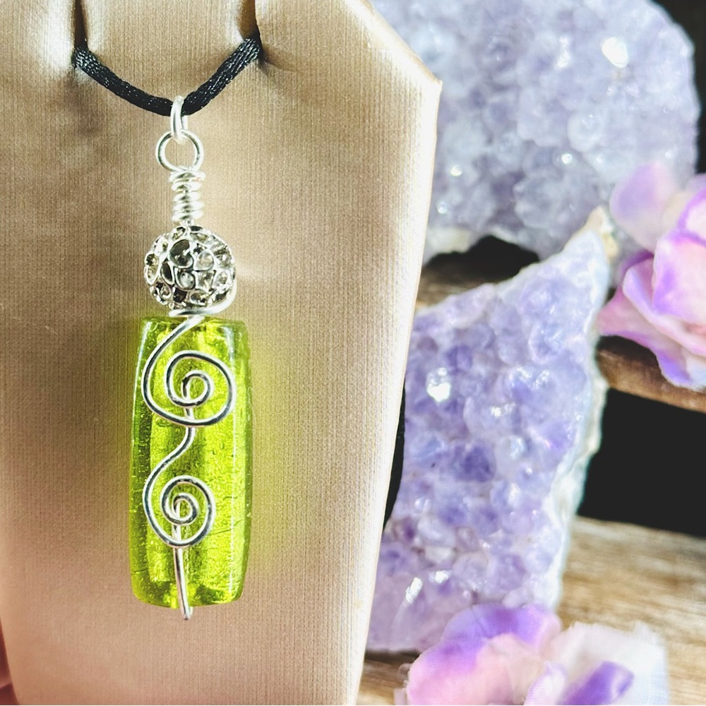 Shimmer-Detail Green Stone Charm with Silver Wire Details on a Black Silk Cord